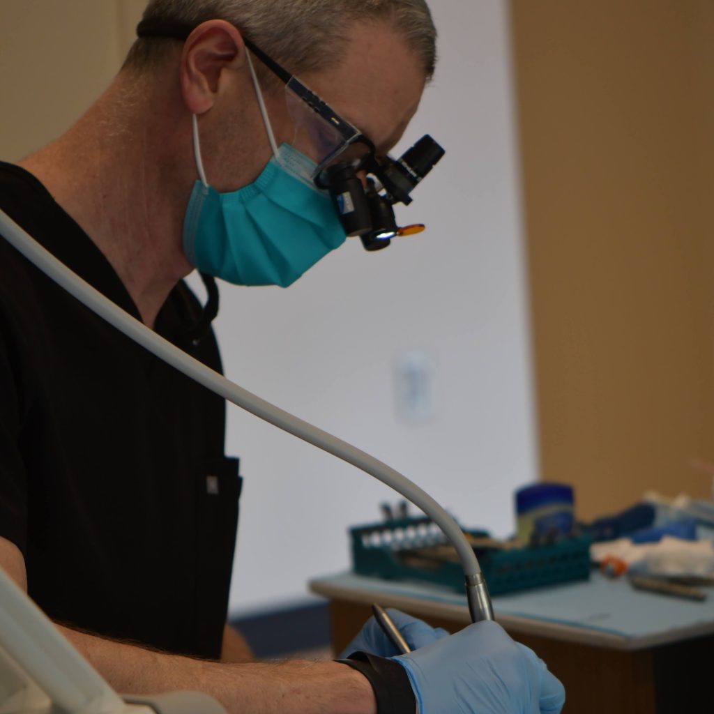 Dr. Joe Chichetti with a patient in the operatory
