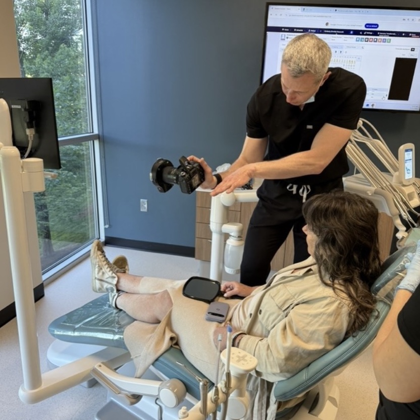 Dr. Joe reviewing smile photos with a patient during a Harmony Smile Assessment